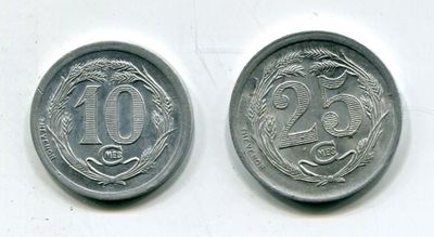 two silver coins with the number 20 on them