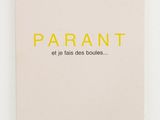 a white book with yellow lettering on it that says parant