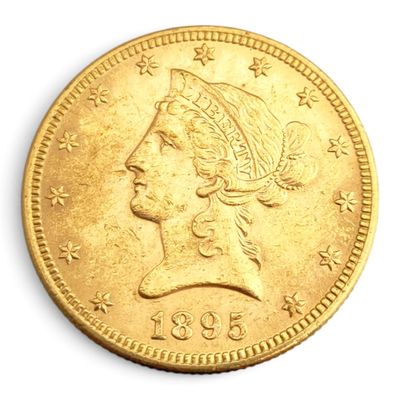 l'image d'une pièce d'or sur laquelle figure une tête de femme