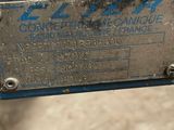 a close up of a piece of metal with a label on it