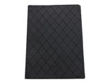 a close up of a black notebook on a white background