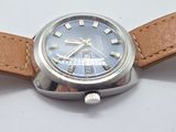 a close up of a wrist watch with a brown strap