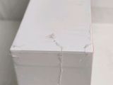 a close up of a white box on a table