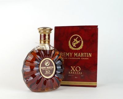 the bottle of remy martin xo special is next to the box