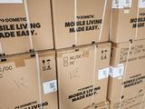 boxes stacked on top of each other on the floor in a warehouse