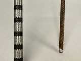 pair of canes with a black and white checkered pattern on them