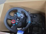 a box with a steering wheel inside of it