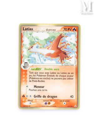 a close up of a pokemon card on a white surface