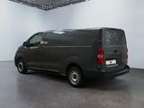 an image of a black van in a white room