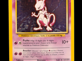 a pokemon card with a picture of a cat on it