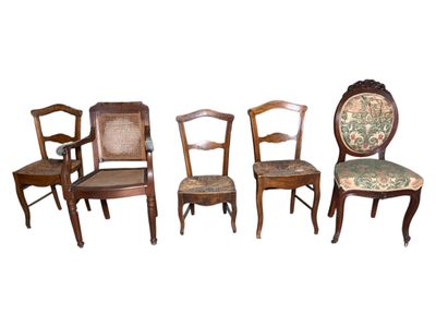 four chairs with upholstered backs and a floral upholstered seat