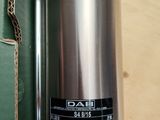 a picture of a stainless steel water heater on a table