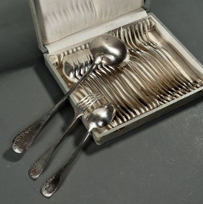 silverware in a box with spoons and spoons in it