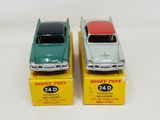 two toy cars that are sitting on top of each other