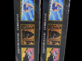 two boxes of incense sitting next to each other on a black background
