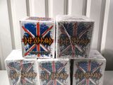 a stack of four boxes with a picture of a british flag on them