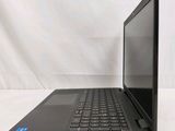 a laptop that is sitting on a white surface