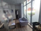 a blurry photo of a living room with a couch and a coffee table