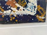 a picture of a painting on display in a glass case