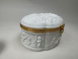 a white box with a gold trim around it and a white box with a gold trim around it