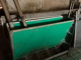 a machine that is working on a piece of metal