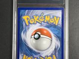 a close up of a pokemon card on a table