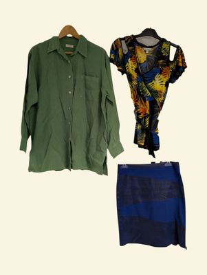 a green shirt, a blue skirt, and a green shirt