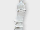 a statue of a woman holding a baby in her arms