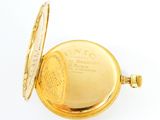an image of a gold pocket watch on a white surface