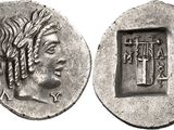 a silver coin with an image of a man on it
