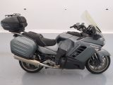 a motorcycle that is parked on the floor in a room