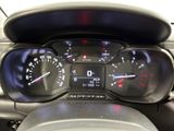 a close up of a car dashboard with a speedometer and gauges