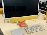 a computer on a desk with a keyboard and mouse