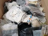 a box full of clothes and other items in it