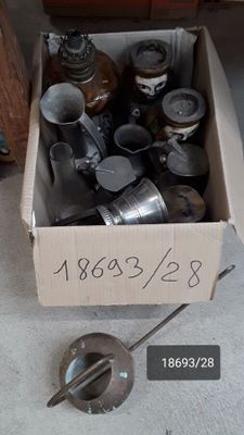 a box full of old items sitting on the floor