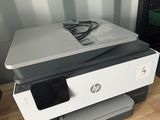 a printer that is sitting on top of a desk