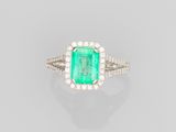 an emerald and diamond ring