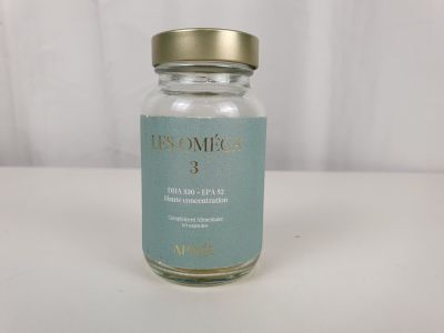 a close up of a glass jar with a label on it