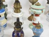 a lot of different types of lamps on the table