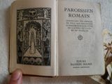 someone is holding an open book with a picture of a woman on it