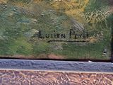 an image of a close up of a painting on a wooden table