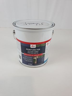 a close up of a paint can on a white surface