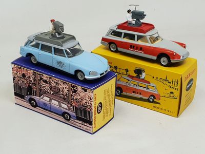 three toy cars that are sitting on top of a box