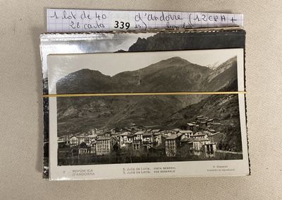 a picture of a black and white photo of a mountain town