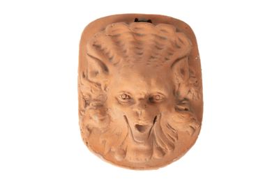 une image représentant une sculpture en argile représentant une tête de lion