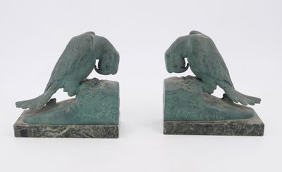 pair of art deco bookends of two birds on a rock