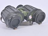 a pair of binoculars that are sitting on the ground