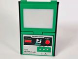 une Nintendo Game Boy verte posée sur une surface blanche
