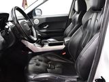 a picture of the interior of a car with black leather seats