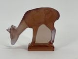 deer figurine on a white background with a white background